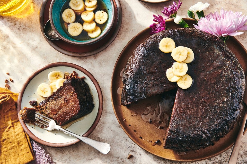 Jamaican Sweet Potato Pudding cake with a slice removed - select to zoom