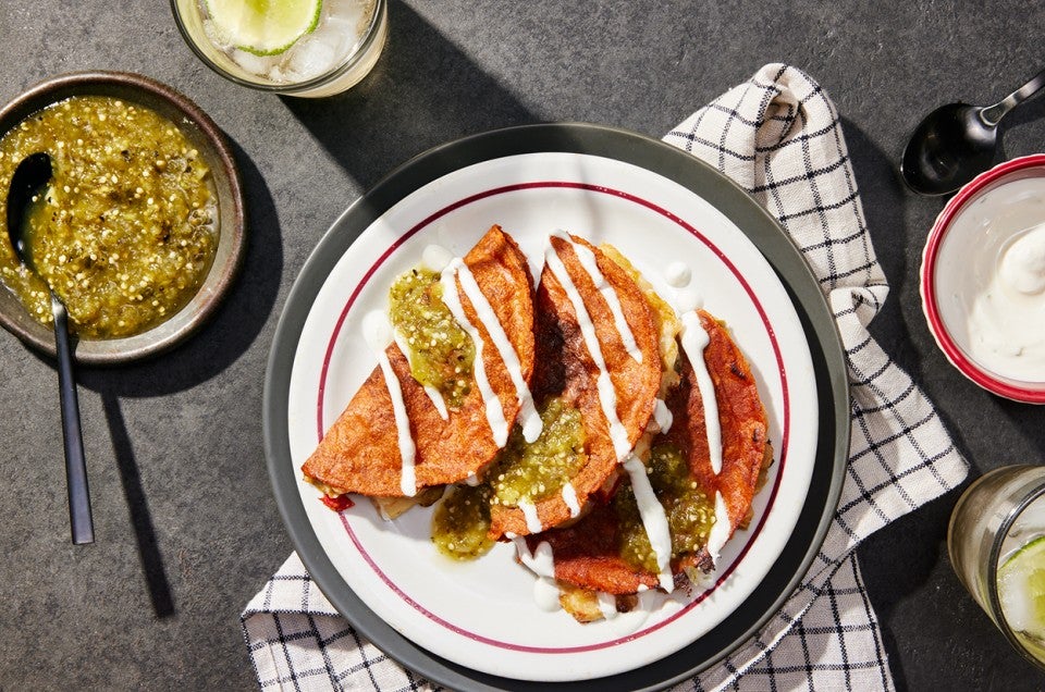 Tacos Rojos (Red Tacos) with Queso Fresco and Salsa Verde - select to zoom