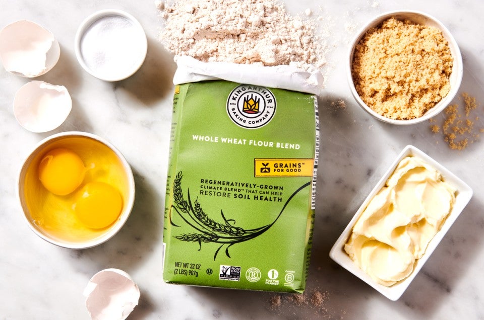 Open bag of Climate Blend flour next to various baking ingredients