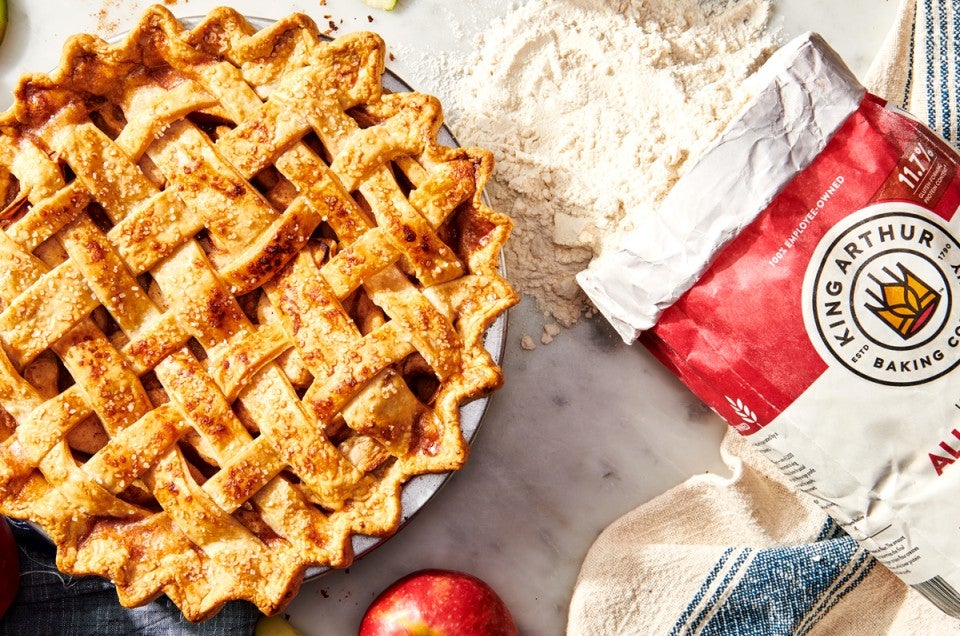 King Arthur all-purpose flour bag next to baked pie