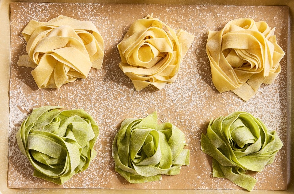 Sourdough Pasta nests on a sheet of parchment