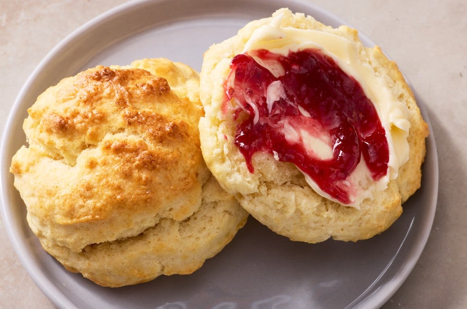 Easy Drop Biscuits with Buttermilk Biscuit Flour on a plate with jam and butter - select to zoom