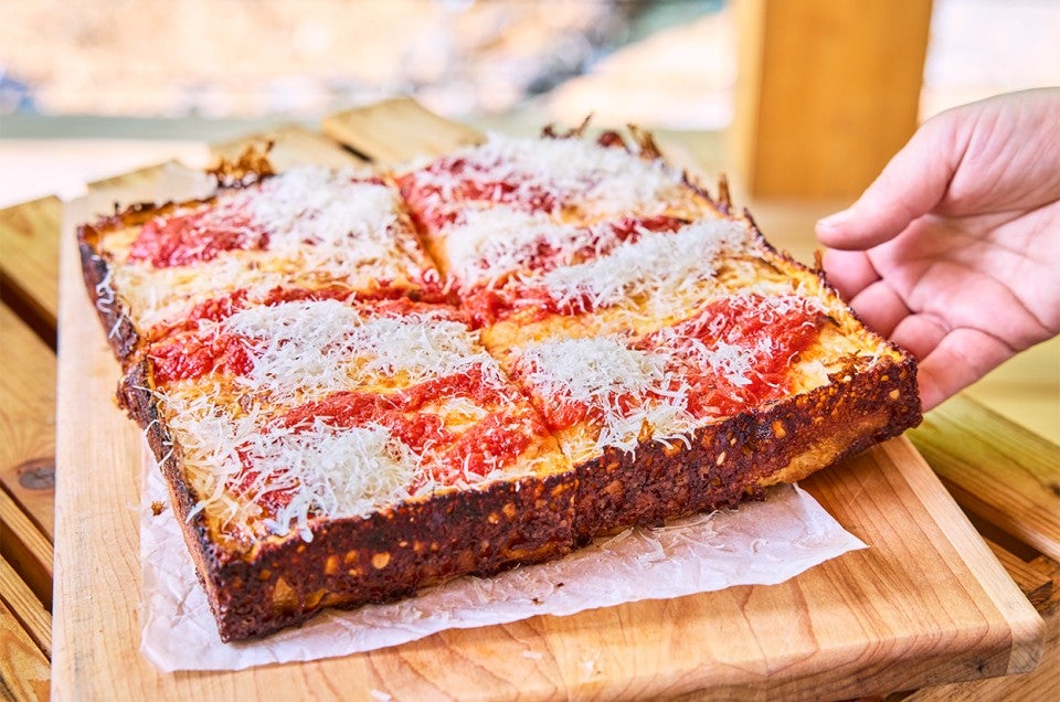 Pizza Oven Detroit Pizza on a cutting board - select to zoom