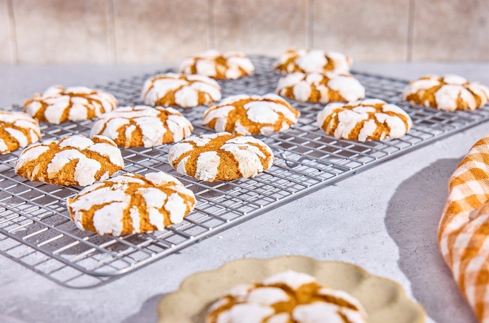 Pumpkin Crinkle Cookies on a cooling rack - select to zoom