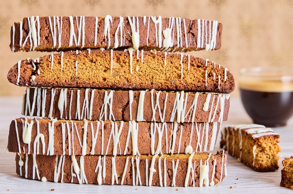Gingerbread Biscotti stacked high on a counter - select to zoom
