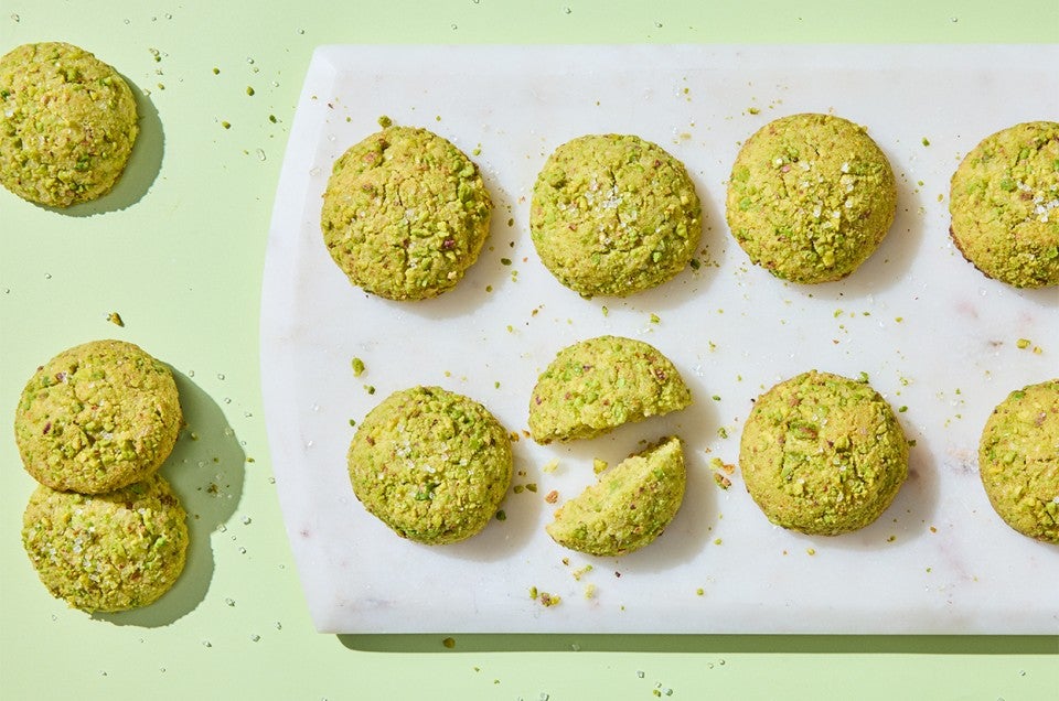 Sparkling Pistachio Cookies on a cutting board - select to zoom