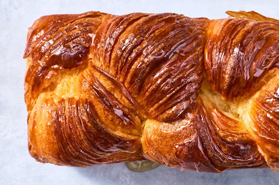 Laminated Challah overhead with honey - select to zoom