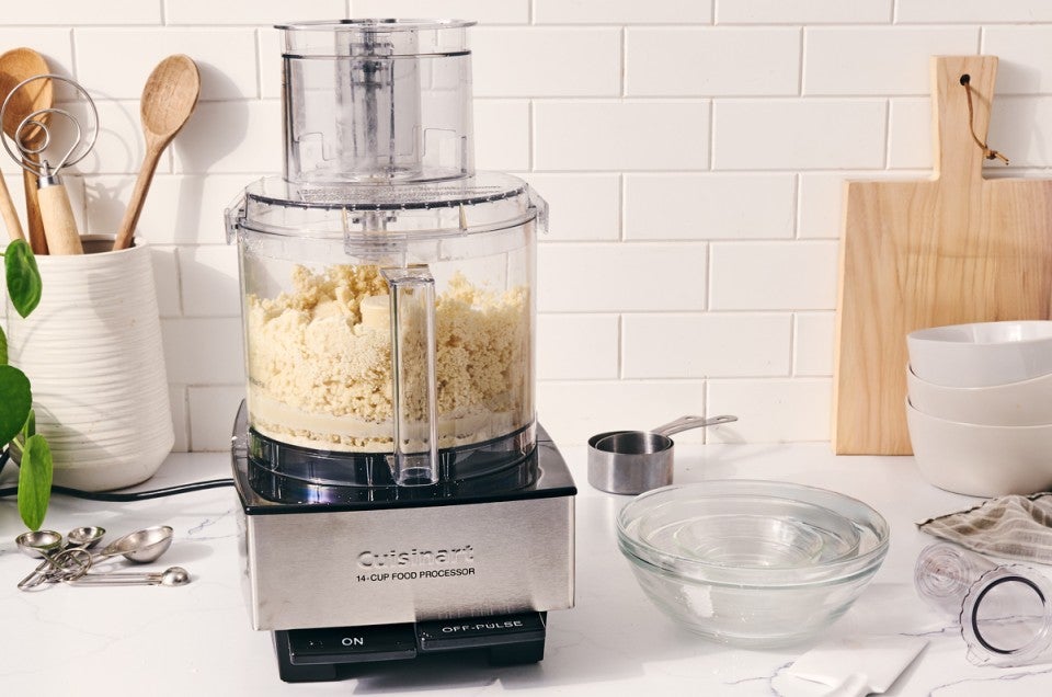 Food processor being used to make almond paste