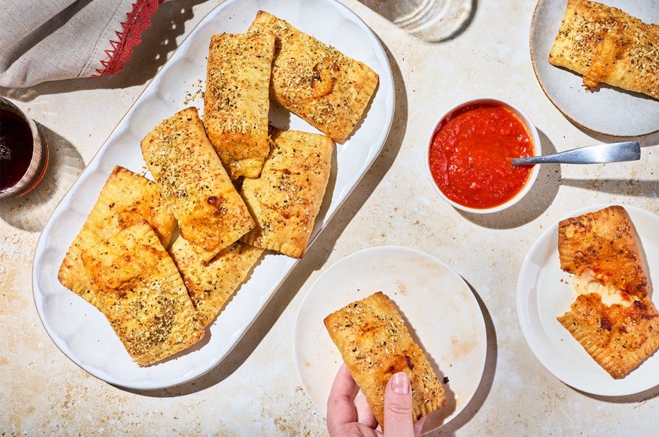 A tray of Homemade Pizza Pockets - select to zoom