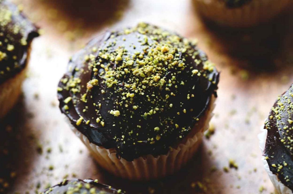 Pistachio-Cardamom Cupcakes with Dark Chocolate Ganache
