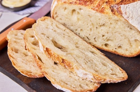 No-Knead Sourdough Bread showing interior crumb - select to zoom