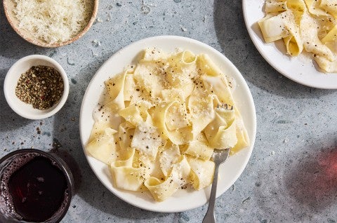 Sourdough Pasta cooked in a white sauce on a plate from overhead - select to zoom