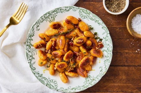 Sweet Potato Gnocchi on a decorative plate from overhead - select to zoom