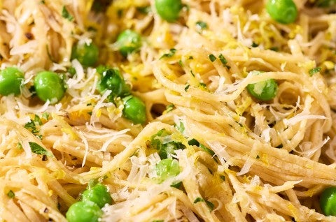 Whole Wheat Pasta with shredded cheese and peas - select to zoom