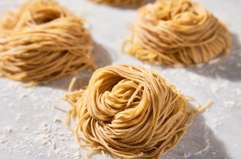 Whole Wheat Pasta nests on parchment - select to zoom