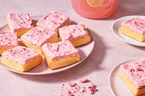 Strawberry Lemonade Bars served on a plate - select to zoom