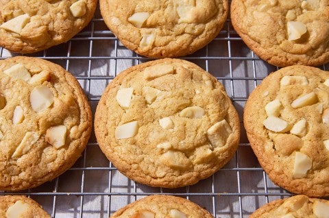 White Chocolate Macadamia Nut Cookies on a cooling rack - select to zoom