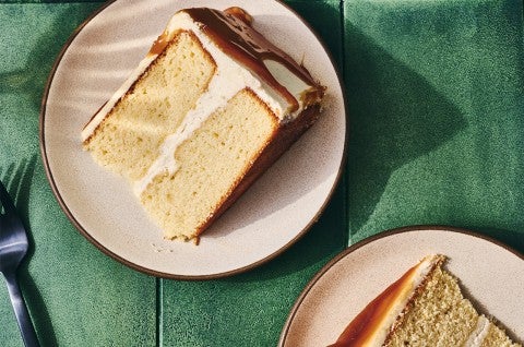 Two slices of Caramel Layer Cake with Brown Butter Frosting on a plate - select to zoom