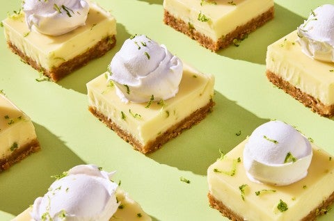 Creamy Key Lime Pie Bars sliced up - select to zoom