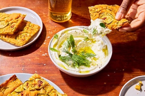 Scarpaccia (Italian Zucchini Tart) dipping into Greek Yogurt Mix - select to zoom