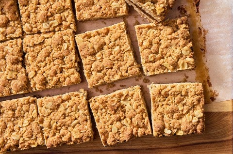 Brown Sugar and Oat Fig Bars on a cutting board - select to zoom