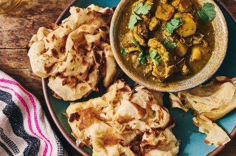 Buss Up Shut (Paratha Roti) on a plate - select to zoom