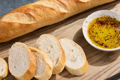 Food Processor French-Style Bread sliced up with dipping oil - select to zoom
