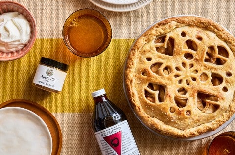 An Apple Pie with Make-Ahead Filling in a pie pan on a table - select to zoom