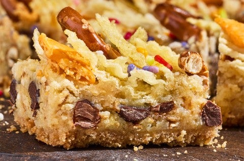 A Kitchen Sink Cookie Bar photographed from the side to show the interior - select to zoom