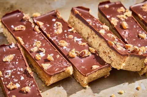 No-Bake Chocolate and Date Energy Bars on parchment paper - select to zoom