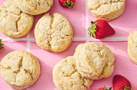 Self-Rising Cream Biscuits on a counter with strawberries - select to zoom