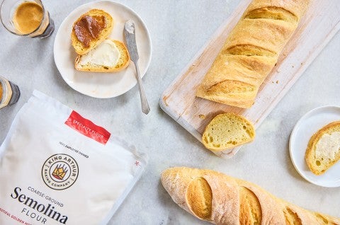 Semolina Baguettes; one has been sliced - select to zoom