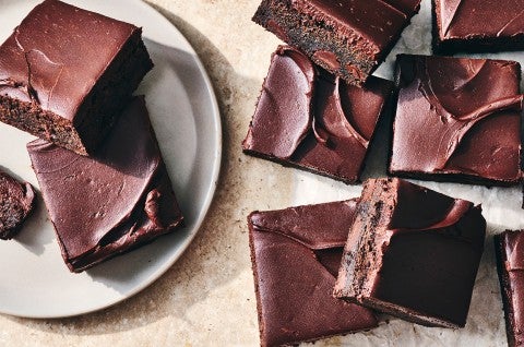 Zucchini Brownies sliced and on a plate - select to zoom