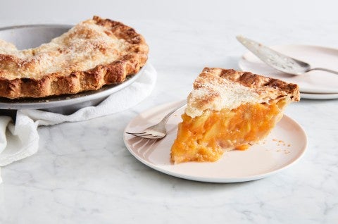 Slice of peach pie