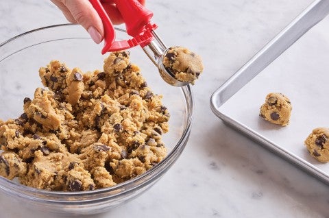 Scooping cookies with a cookie scoop