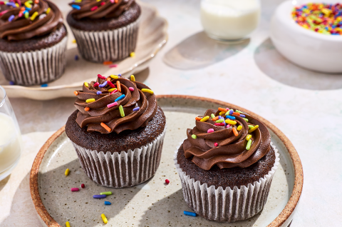 Small-Batch Chocolate Cupcakes on plates. - select to zoom