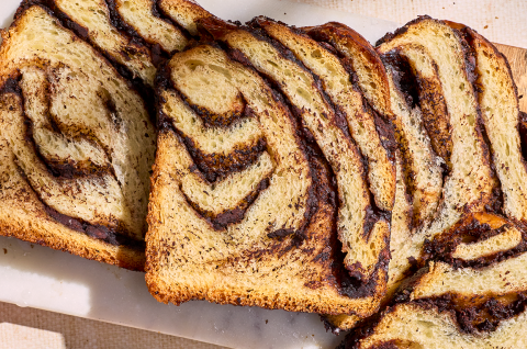 Slices of Chocolate Sourdough Babka on a counter. - select to zoom