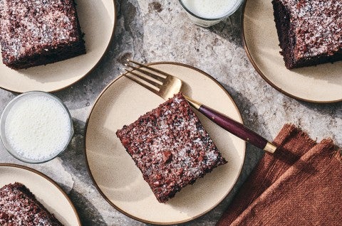 Chocolate Olive Oil Cake on a plate. - select to zoom
