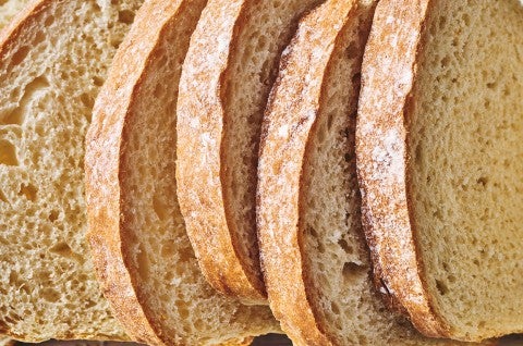 Detailed photograph of slices of classic sandwich bread. - select to zoom