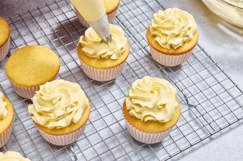 Piping French Buttercream onto cupcakes - select to zoom
