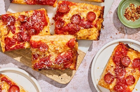 Slices of Weeknight Detroit Pizza arranged on a table. - select to zoom