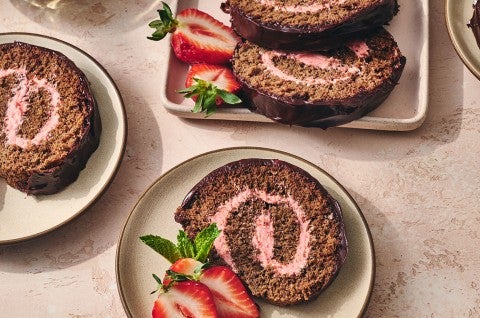 Chocolate Strawberry Roll Cake sliced and seen from above - select to zoom