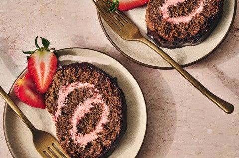 Chocolate Strawberry Roll Cake on plates - select to zoom