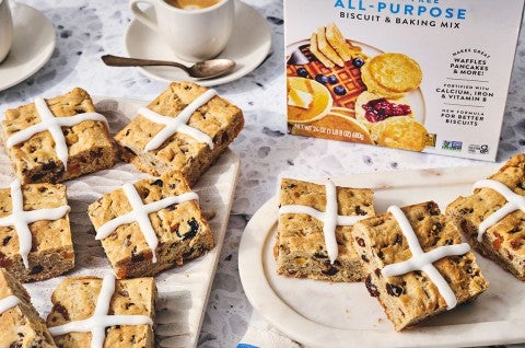 Gluten Free Hot Cross Biscuits on a counter with a box of King Arthur Baking Gluten Fee All Purpose in the background - select to zoom