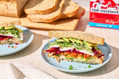 A sandwich made with Golden Grains Bread