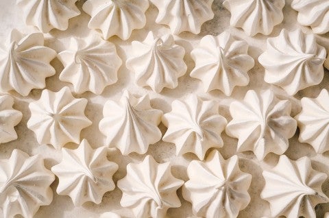 Looking down on neatly organized Meringue Kisses - select to zoom
