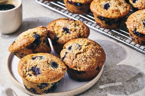 Sourdough Discard Blueberry Muffins on a plate. - select to zoom