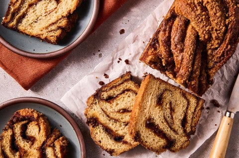 Cinnamon Babka slices arranged on a counter with thick swirls of cinnamon - select to zoom