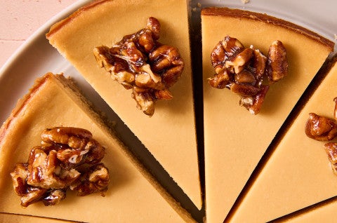 Close-up of Maple Pecan Cheesecake sliced neatly and seen from above - select to zoom