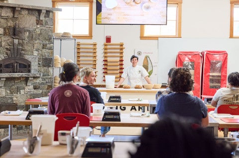 An instructor leading a class at the Norwich, VT baking school for King Arthur Baking